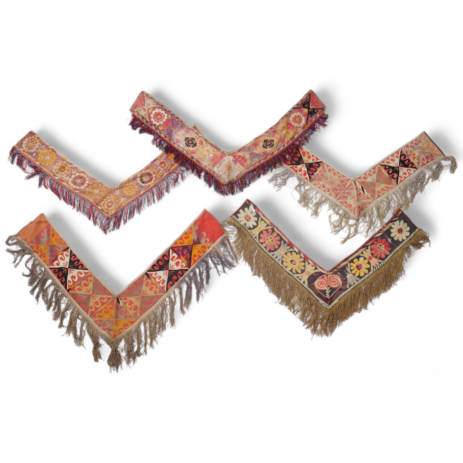 Five various sized late 19th / early 20th century Usbek Saye Gosha (V shaped) Suzani silk embroidered bridal yurt wall hangings, usually forming part of a dowry, two with later fringing, longest 172cm. Condition - some f